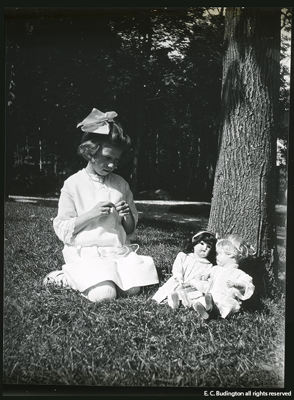 Girl with Dolls